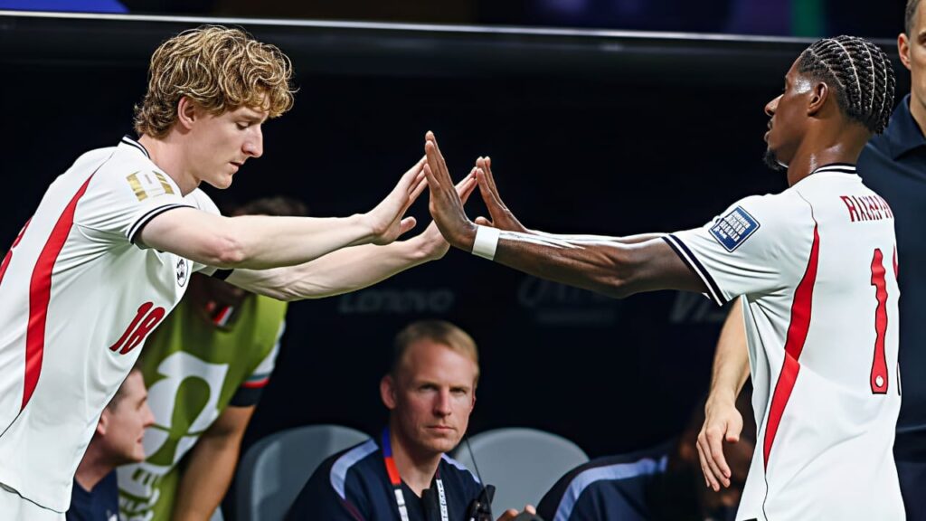 Anthony Gordon celebrates after providing two assists for Harry Kane during England's 2-1 World Cup Round of 32 victory over DR Congo.